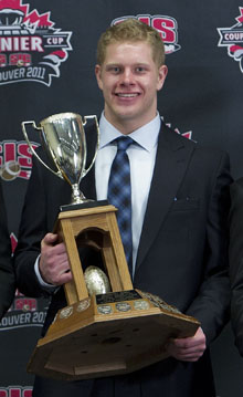 Max Caron with the Presidents' Trophy