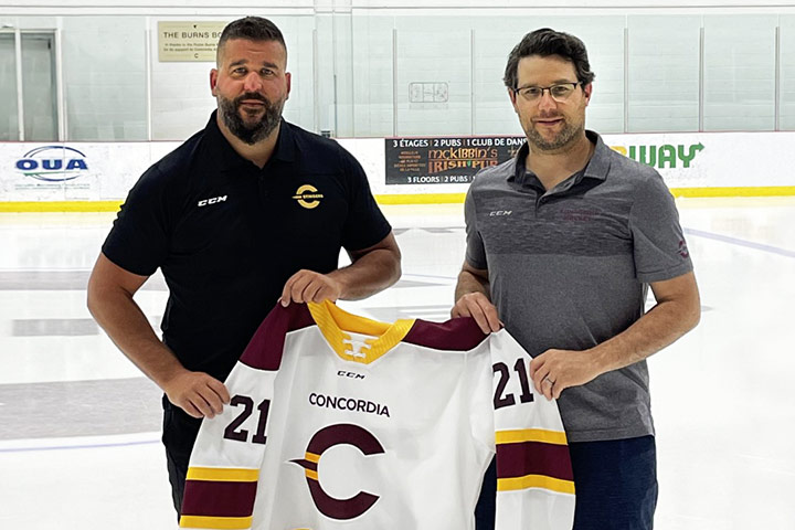 Marc-André Elément (right) welcomes coach Mathieu Chouinard to Concordia.