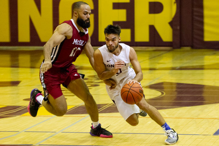 Point guard Sami Jahan takes it up the court against McGill on Saturday afternoon.